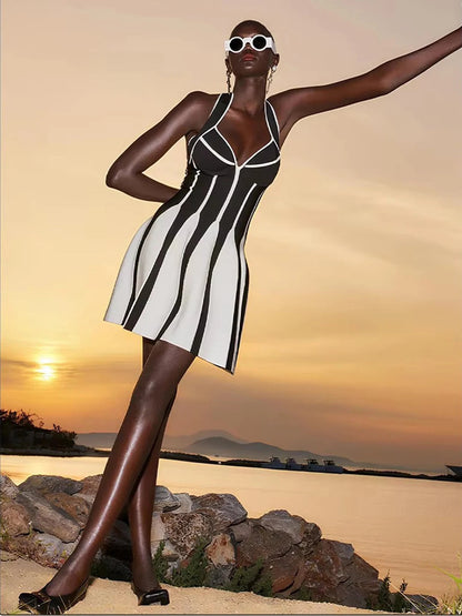 Women's knitted ice silk striped dress with halter neck and open back design